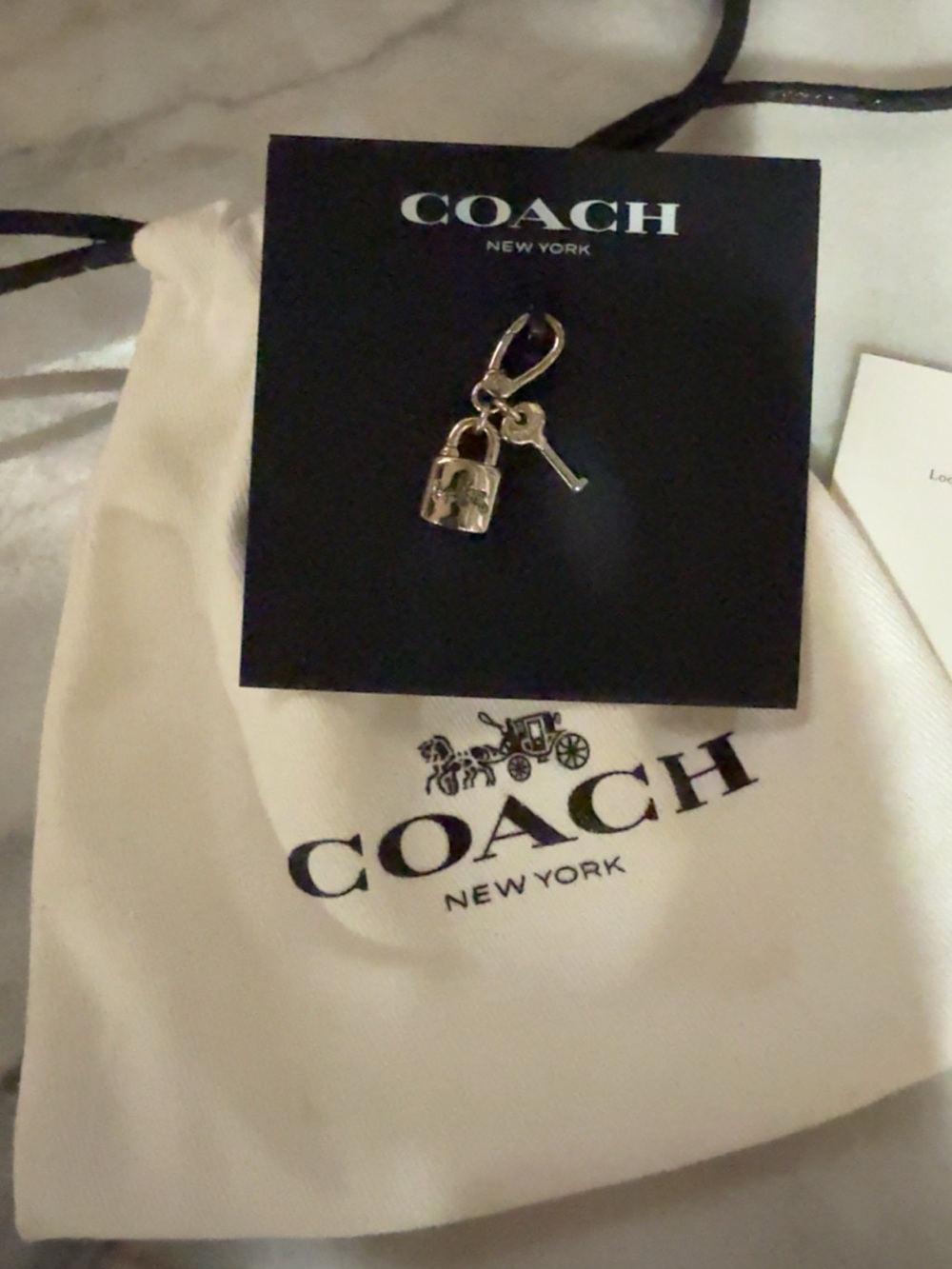 ***SOLD**


NWT Coach Padlock & Key Charm w/ Dust-Bag - Picture 4 of 6